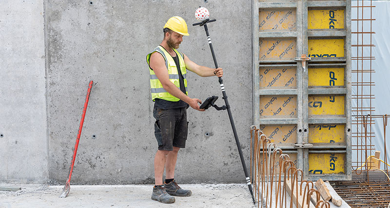 Leica iCS50 robotic construction tool with easy Snap-On tripod.